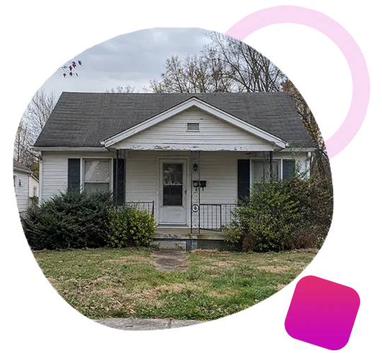 One-story white cottage home with overgrown shrubs needing exterior maintenance in a Fern Creek neighborhood.